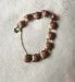 Gestolen armband met bloedkoraal